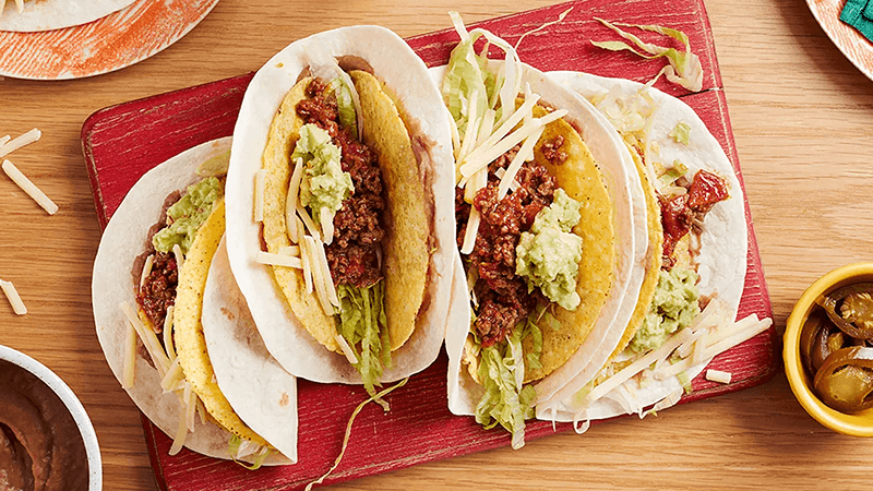 double layer beef tacos with cheese & sauce