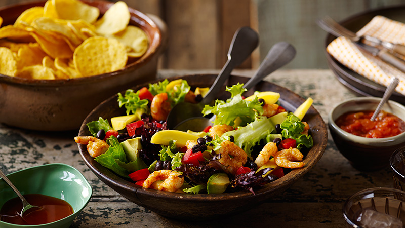 prawn and mango taco salad served in a bowl